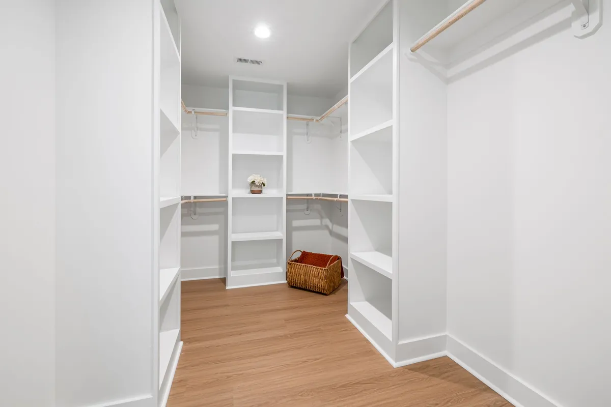 over-the-door organizer with shoes and rolled scarves