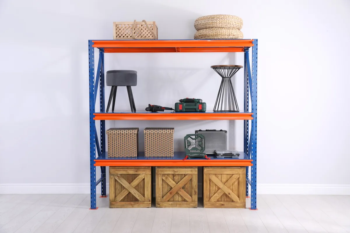 overhead ceiling storage rack in garage with plastic tubs