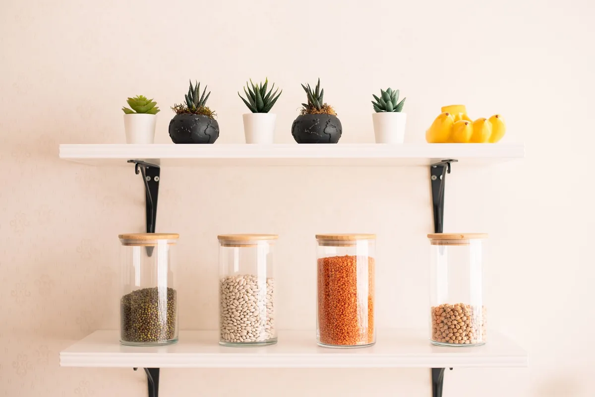 small colorful snack containers open with crackers and nuts