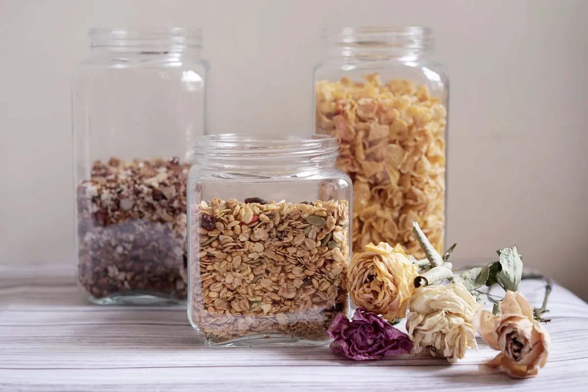 glass bail clasp jars with oats and coffee on kitchen counter