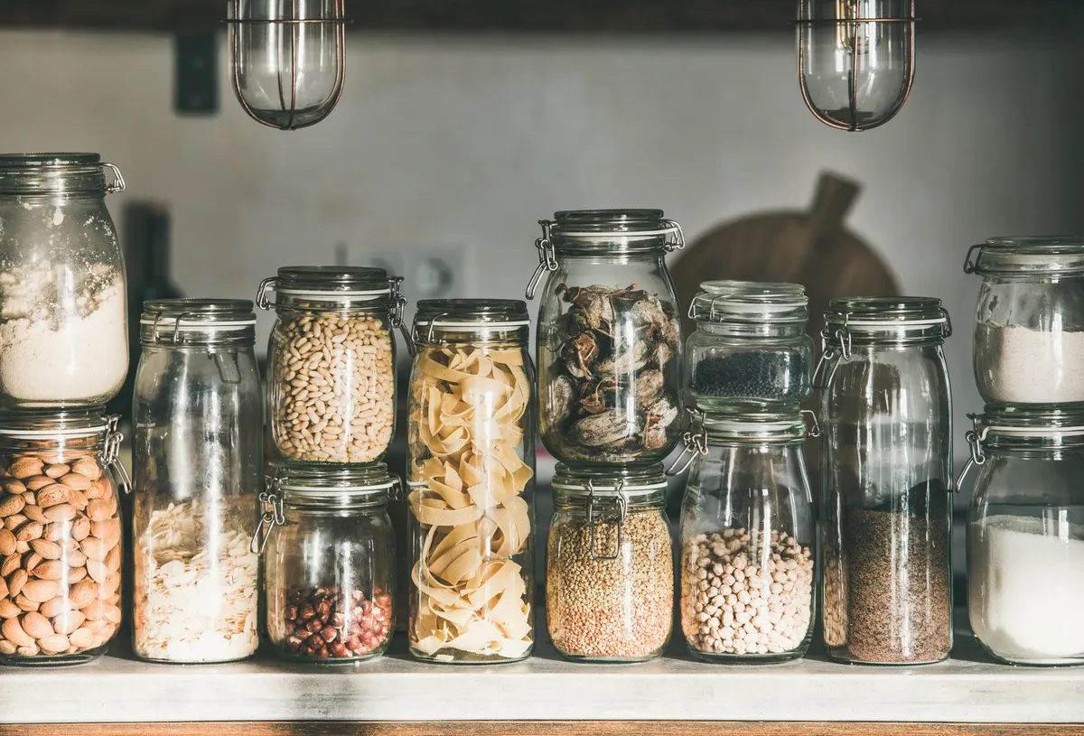wire basket hanging under kitchen cabinet shelf