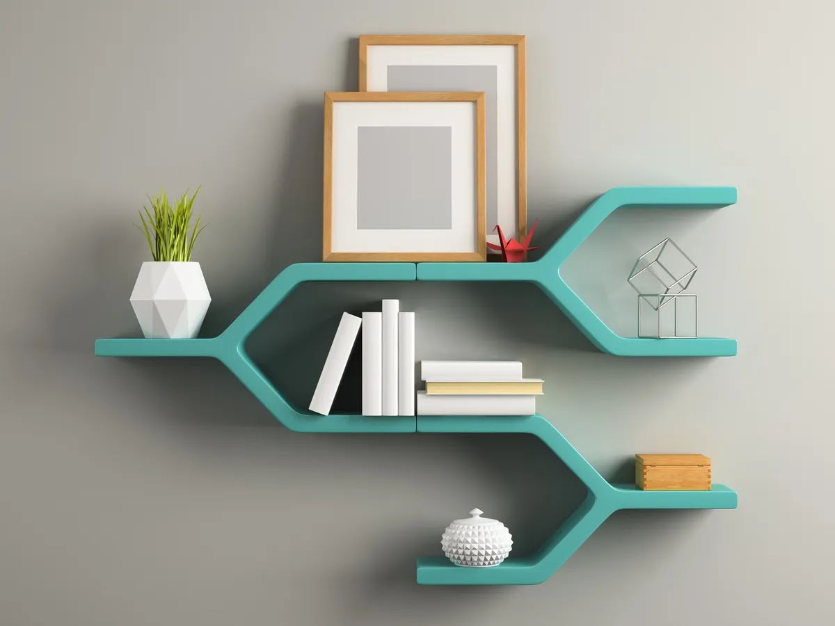 small floating wood shelf beside bed with lamp and book