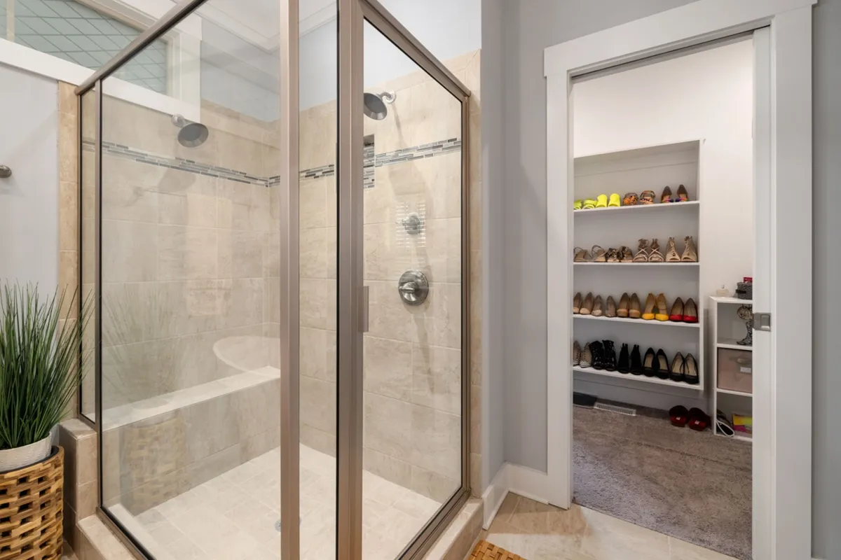 tension rod holding heels in closet corner